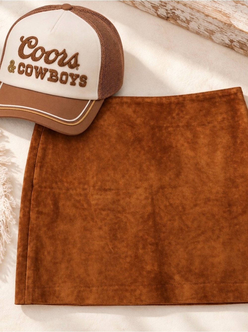 DKNY 100% leather brown Mini Skirt. size 6 + Cowboy trucker hat.